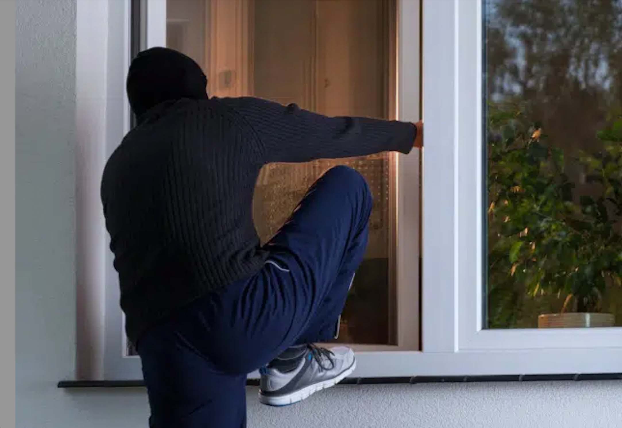 breaking in through window